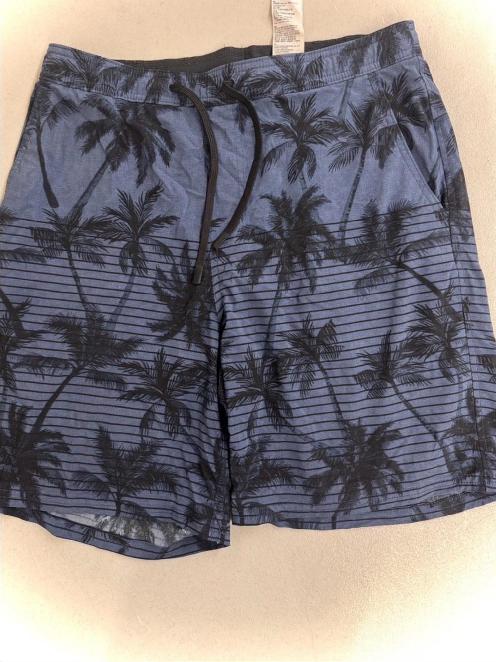 Kirkland Signature Blue Swim Shorts with Black Palm Print